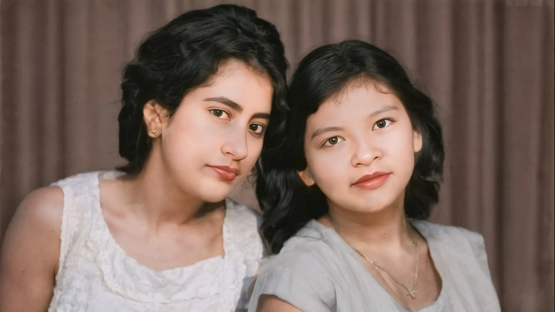 Recuperación de color y nitidez en retrato familiar antiguo - Después